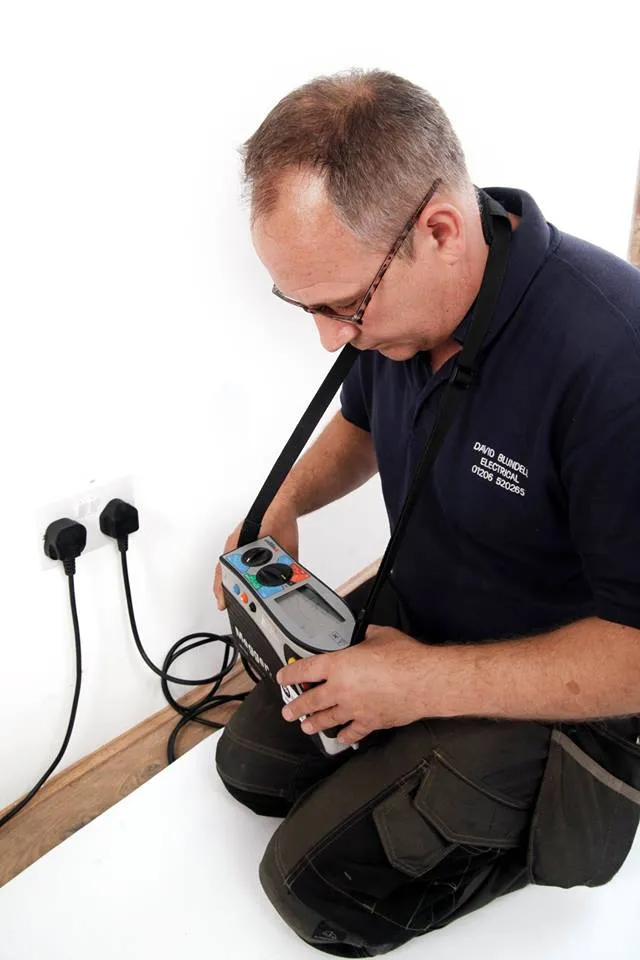 David Blundell carrying out electrical testing